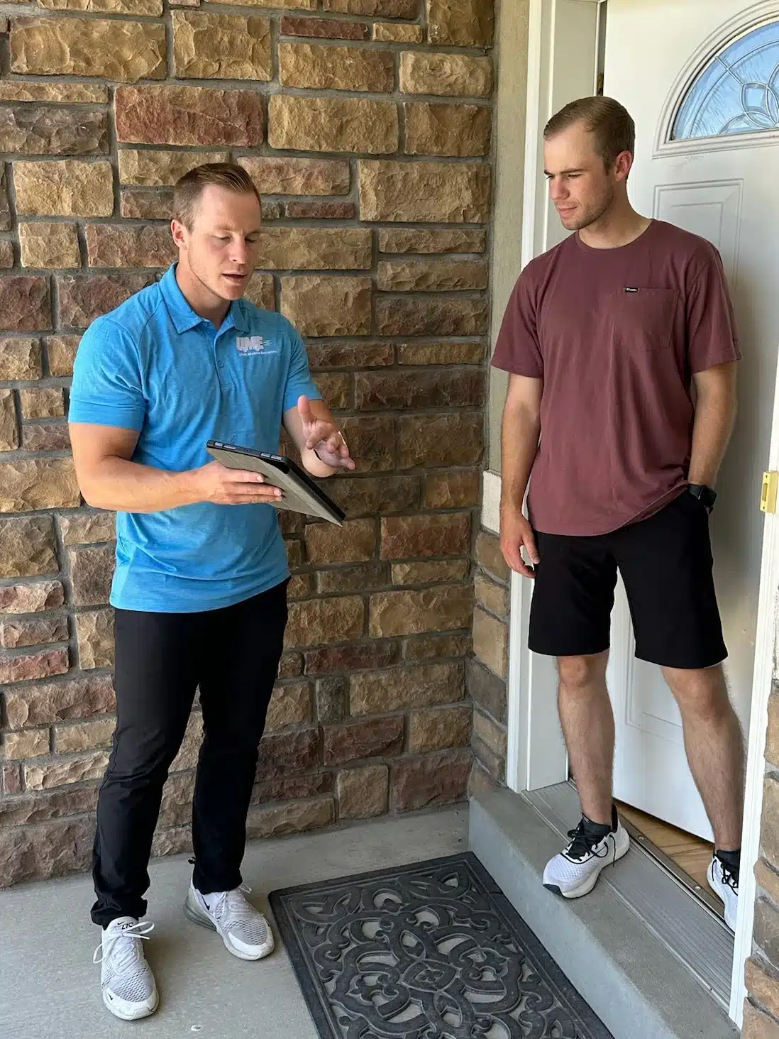 Mobile Emissions owner helping a customer with an On-The-Spot Renewal appointment in Utah